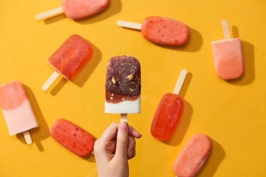 Wonam hand holding chocola milk popsicle