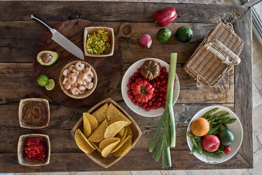 Top view at different meal on wood worktop