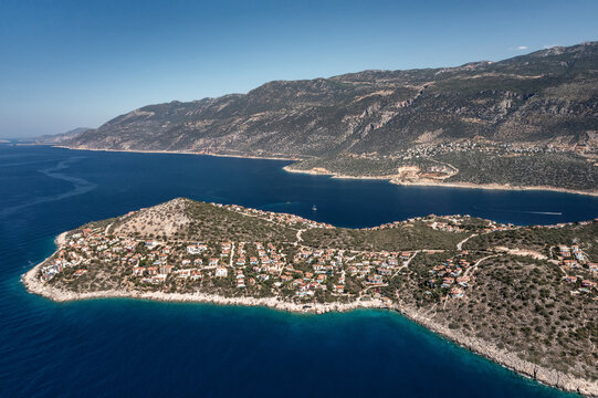 Panoramic view at seashore with mountains and villas
