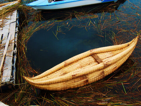 Lake Titicaca altiplano bolivia, highest lake in the world, chosa totora water customs rustic yesteryear boat background