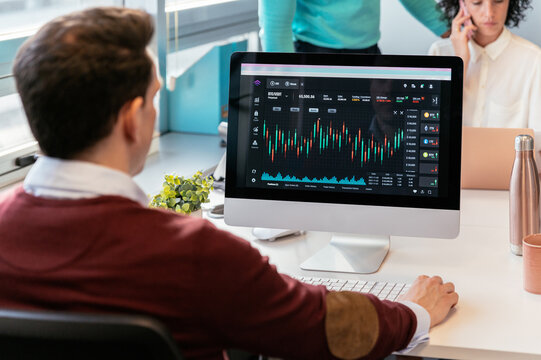 crop businessman working on computer in office