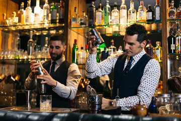 Professional team of bartenders working