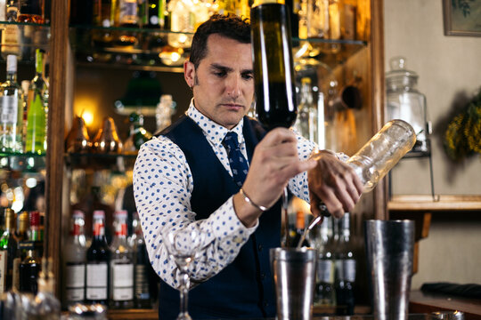 Professional bartender working in night club
