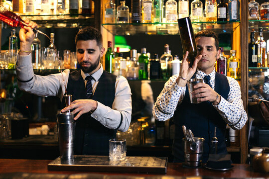 Professional team of bartenders working