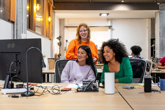 Diverse colleagues having a video conference in office