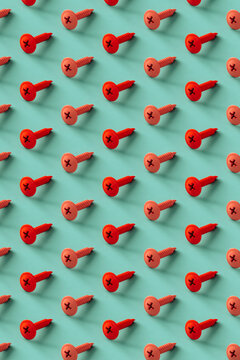 pattern of pink and red screws on a blue background. 3d render