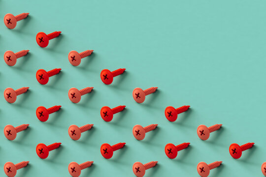 collection of pink screws with copy space in the corner