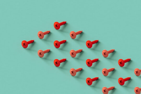 rows of pink screws on a blue background