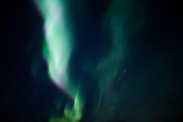 Northern Lights Creates a Display of Light and Color On the Starry Sky