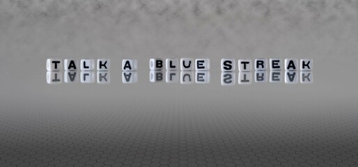 talk a blue streak word or concept represented by black and white letter cubes on a grey horizon...