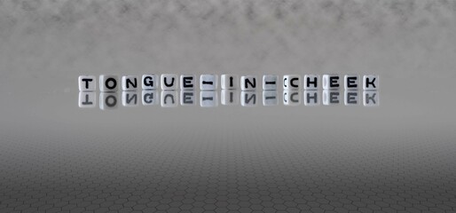tongue in cheek word or concept represented by black and white letter cubes on a grey horizon...