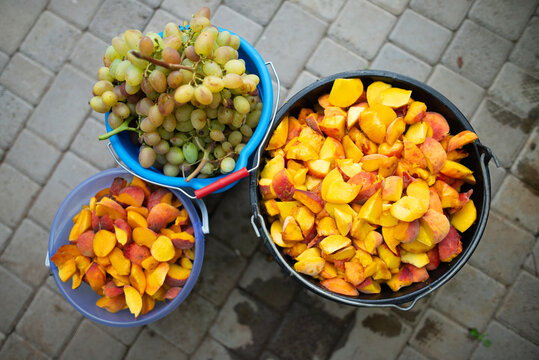 Organic Ripe Peaches And Grapes