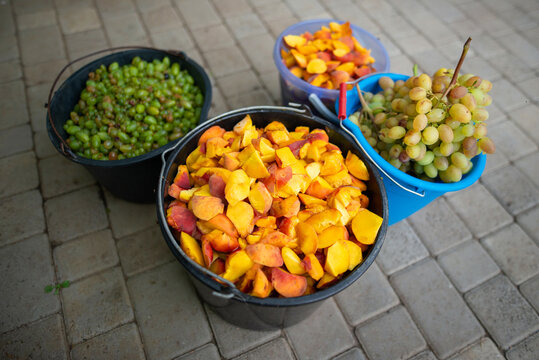 Ripe Fresh Peaches And Grape Bunches 