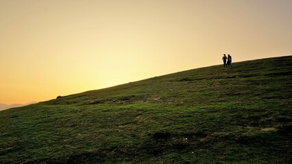 Tourists enjoying the Beautiful view of Wenlock Downs 9th Mile Shooting Point, Ooty during sunset....