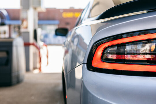 Focus On Car Taillight At Gas Pump