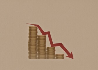 The red arrow falls down over the stack of coins