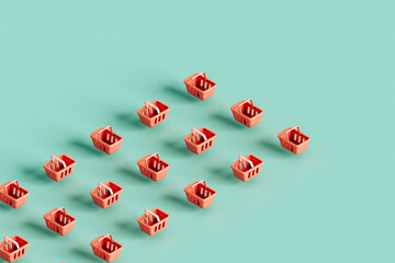 Lines of orange shopping baskets