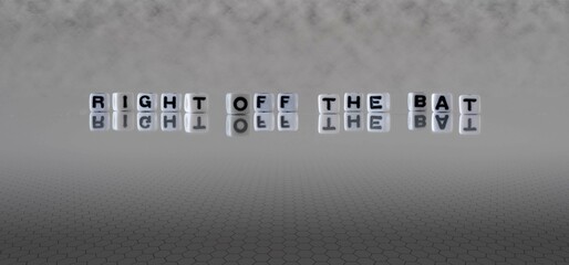 right off the bat word or concept represented by black and white letter cubes on a grey horizon...