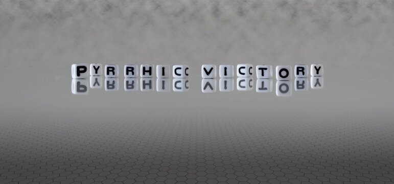 pyrrhic victory word or concept represented by black and white letter cubes on a grey horizon background stretching to infinity