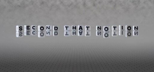 second that notion word or concept represented by black and white letter cubes on a grey horizon...