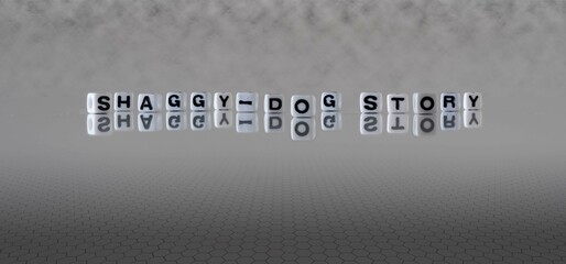 shaggy dog story word or concept represented by black and white letter cubes on a grey horizon...