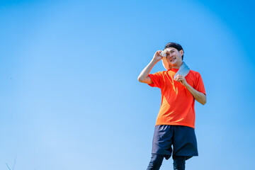 ランニングをする若い男性　スポーツイメージ