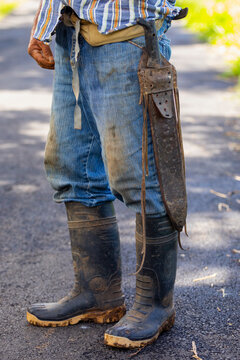 Farmer in Costa Rica with Machete and jeans 