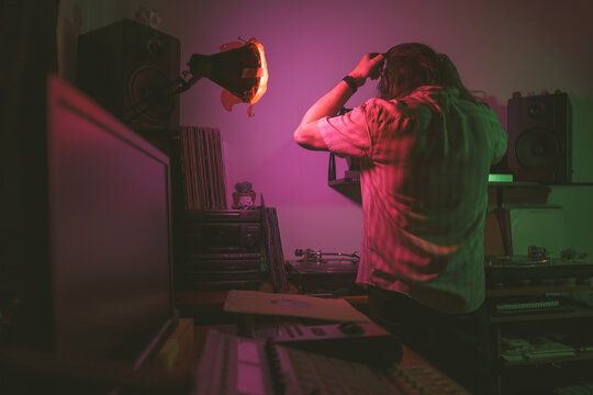 Dj Putting On Headphones