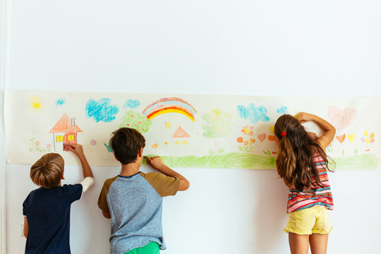 Children Artist Drawing With Crayons 