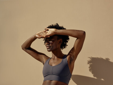 woman protecting herself from the sun
