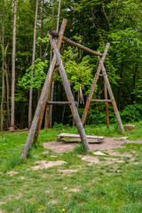 Wooden Garden Swing Seat in the park.