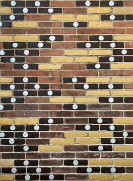 brick wall with dots