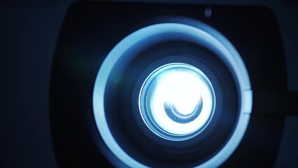 Turning off the digital 4k projector. Modern digital projector. Projection of the presentation or...