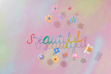 Plasticine clay form the words "Beautiful" and multicolor