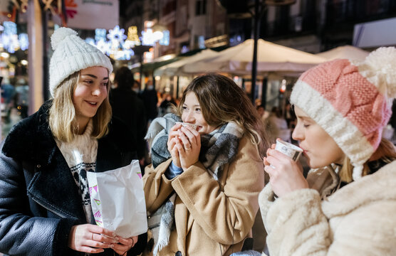 Three young women in the city