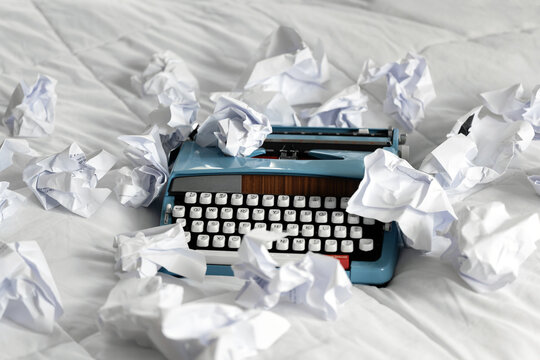 Typewriter with crumpled up paper