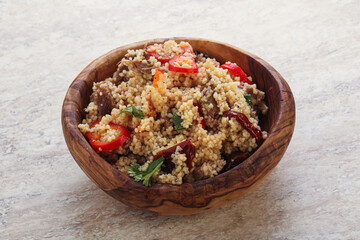 Arabic cous cous with meat and tomato