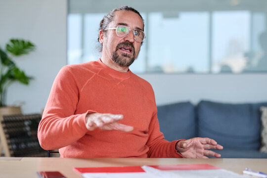 Businessman speaking during meeting