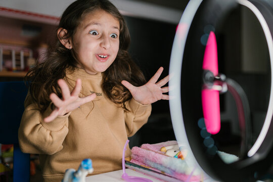 Little blogger telling exciting story