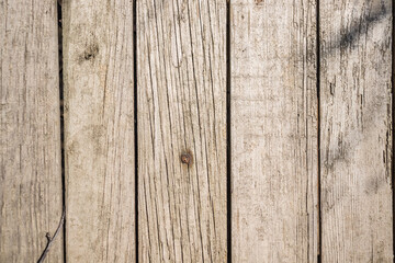 Wall, fence made of old wooden boards as a beautiful background