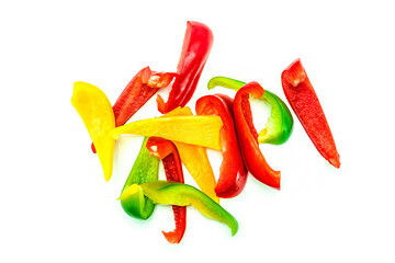 Sliced tricolor pepper with chopsticks, on a white background