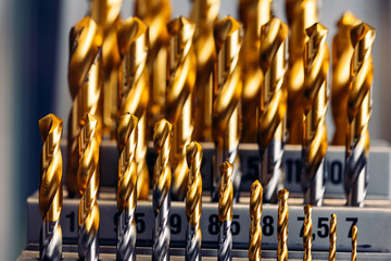 Closeup macro photo drill bit for CNC machine cutting sheet metal