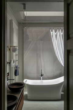 Interior in modern style with freestanding bathtub