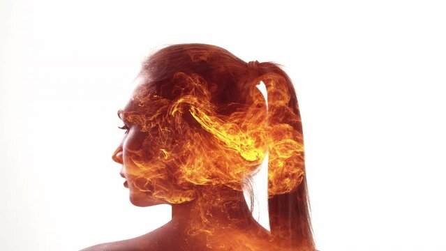 Emotional burnout. Anxiety attack. Mental crisis. Double exposure profile silhouette of disturbed tired woman head on orange yellow fire flames isolated on white.