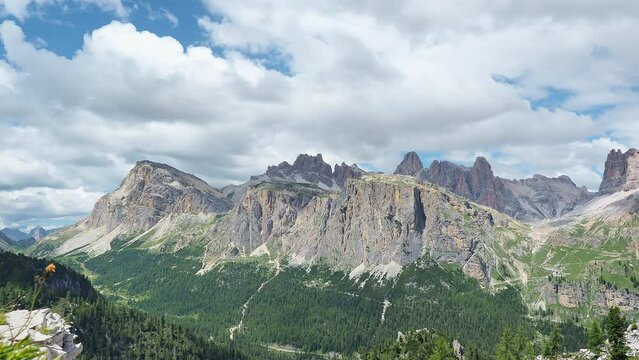 Amazing landscape on the Dolomites. Time lapse to the peaks called Conturines,  Pizes de Fanis, Lagazuoi and Falzarego mountain pass.  Alta Badia, Sud Tirol, Italy