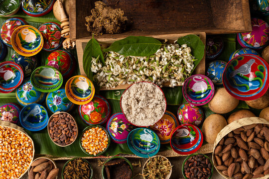 Jicaras, baskets and wooden containers with ingredients