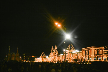 Shopping with Christmas lights all around it at night