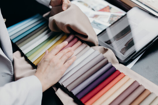 Anonymous Woman Choosing Fabric