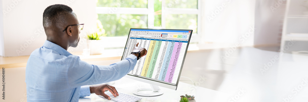 Poster analyst employee working with spreadsheet