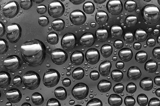 Condensation 44 macro closeup water droplets on dark plastic